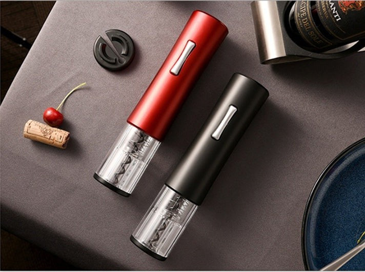 Abrebotellas eléctrico Nova Home en rojo y negro con diseño elegante, base transparente y cortador de papel aluminio.