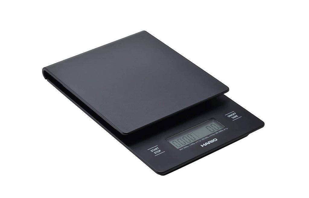 Báscula digital negra Hario V60 de Nova Home con temporizador integrado para precisión en la preparación de café